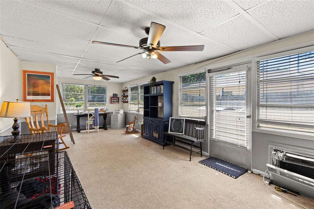 1361 Belleair Road Clearwater, FL 33756 - Photo 10 of 19 an empty room with furniture and windows