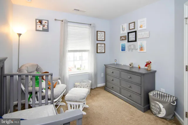 a room with furniture and a window