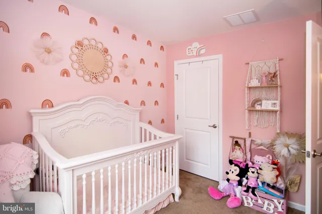 a bedroom with furniture and a bathtub