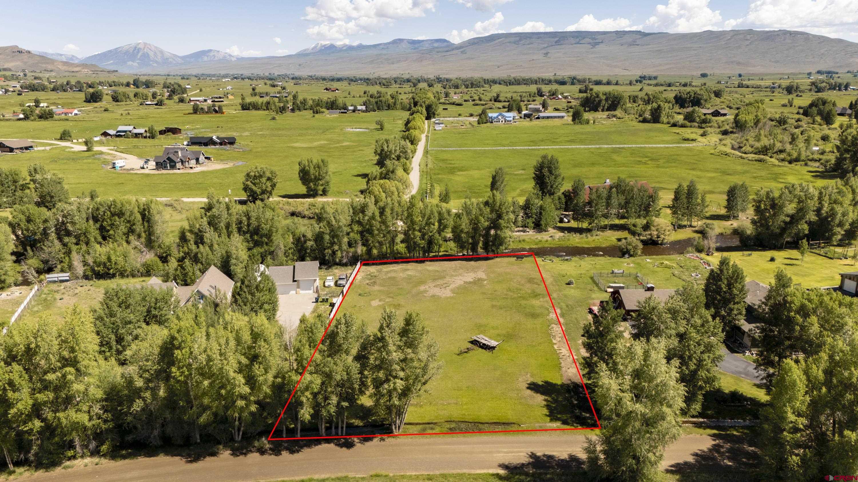 205 Spring Meadow Trail Gunnison, CO 81230 - Photo 16 of 34 a view of a city with an ocean