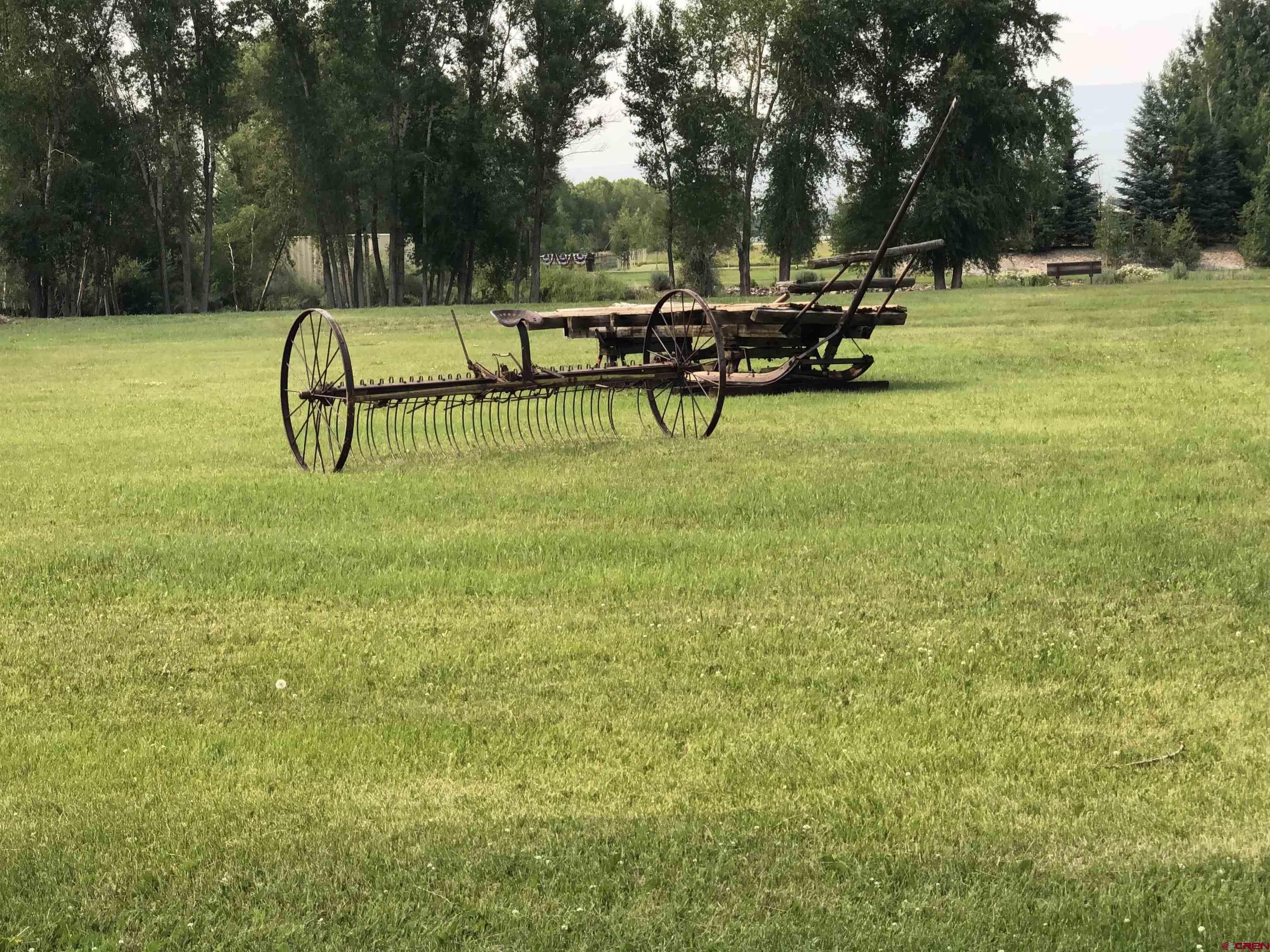 205 Spring Meadow Trail Gunnison, CO 81230 - Photo 31 of 34 a view of a park with swings and slides