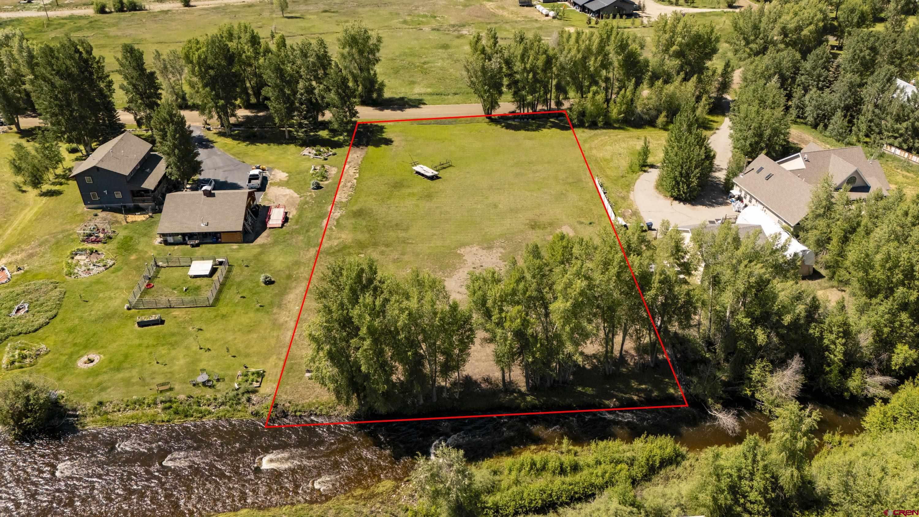 205 Spring Meadow Trail Gunnison, CO 81230 - Photo 4 of 34 an aerial view of a residential houses with yard
