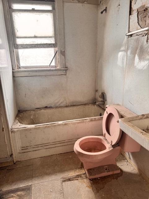 640 Polk Street Gary, IN 46402 - Photo 8 of 16 a bathroom with a toilet and a sink