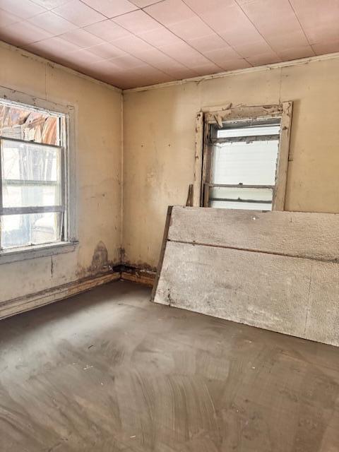 640 Polk Street Gary, IN 46402 - Photo 10 of 16 a spacious bedroom with a bed and a window