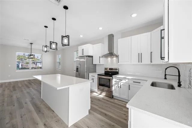 a bathroom with a toilet sink and tub