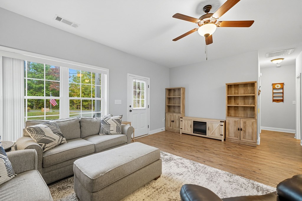 716 Old Pleasant Valley Road Talking Rock, GA 30175 - Photo 21 of 58 a living room with furniture and a flat screen tv