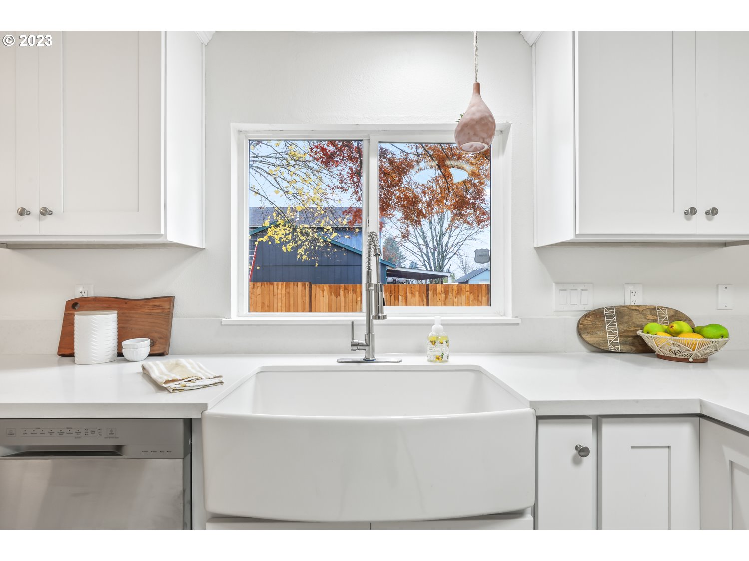 1203 Southeast Barnes Road Gresham, OR 97080 - Photo 14 of 43 a bathroom with a sink and a window