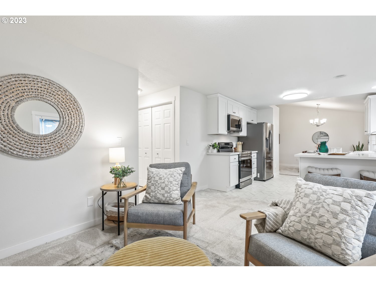 1203 Southeast Barnes Road Gresham, OR 97080 - Photo 17 of 43 a living room with furniture and a wooden floor