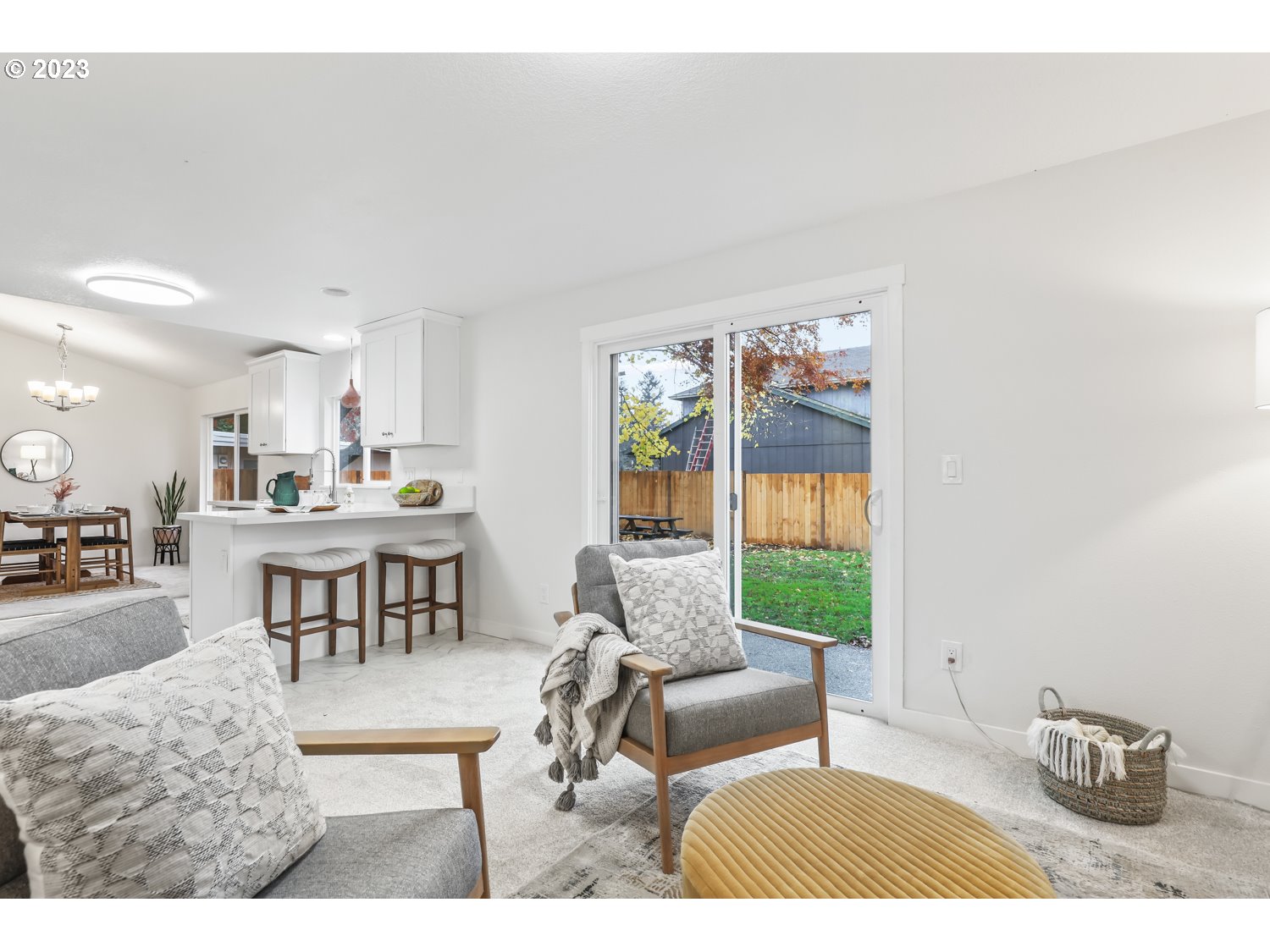 1203 Southeast Barnes Road Gresham, OR 97080 - Photo 18 of 43 a living room with furniture and a table