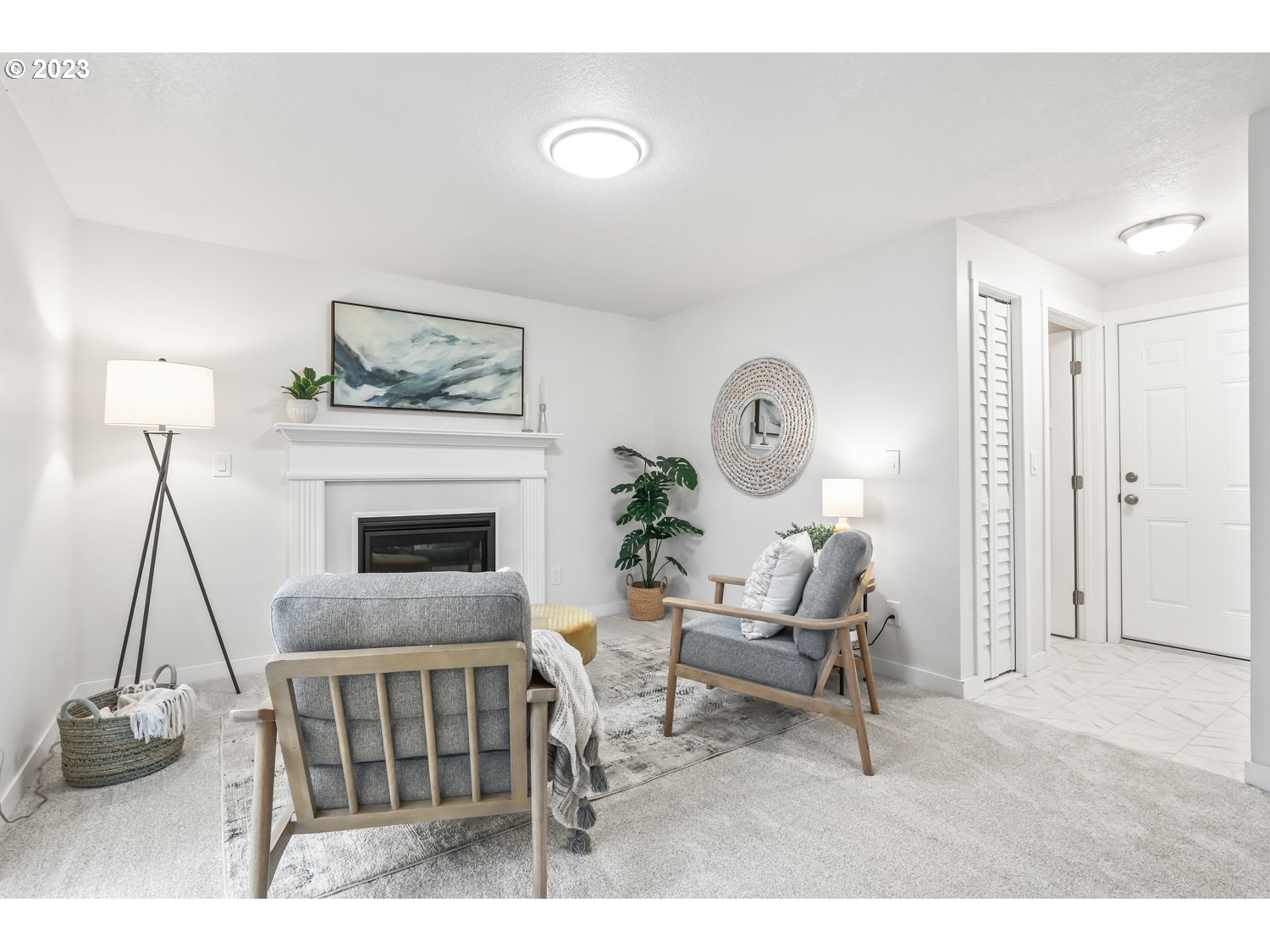 1203 Southeast Barnes Road Gresham, OR 97080 - Photo 20 of 43 a living room with furniture and a fireplace