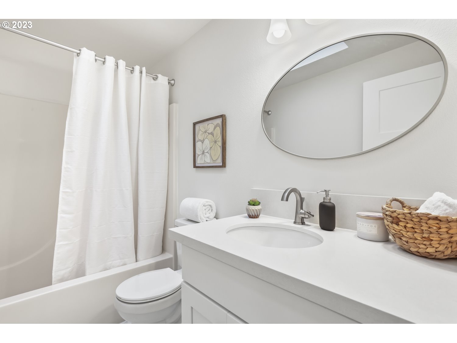 1203 Southeast Barnes Road Gresham, OR 97080 - Photo 24 of 43 a bathroom with a sink mirror and toilet