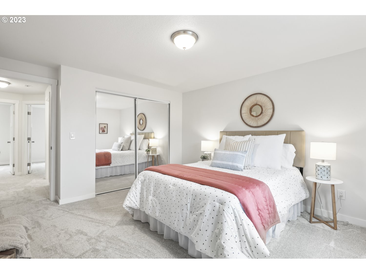 1203 Southeast Barnes Road Gresham, OR 97080 - Photo 29 of 43 a bedroom with a bed and a lamp