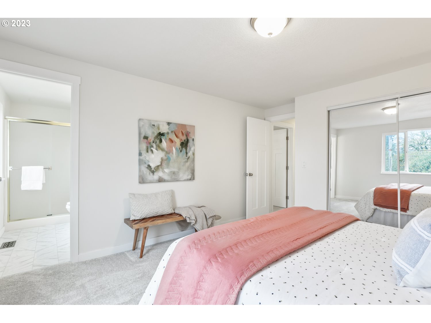 1203 Southeast Barnes Road Gresham, OR 97080 - Photo 30 of 43 a bedroom with a bed and a painting on the wall