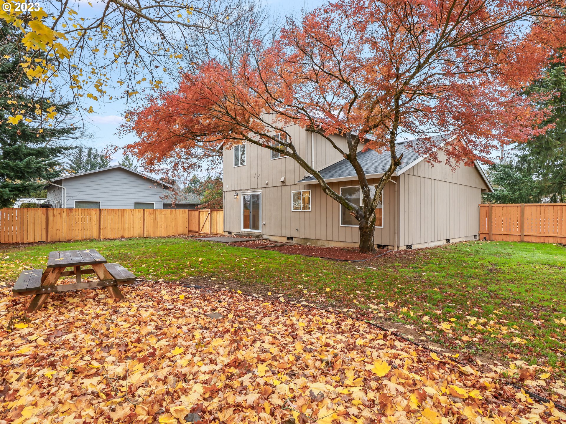 1203 Southeast Barnes Road Gresham, OR 97080 - Photo 36 of 43 a view of a house with a yard