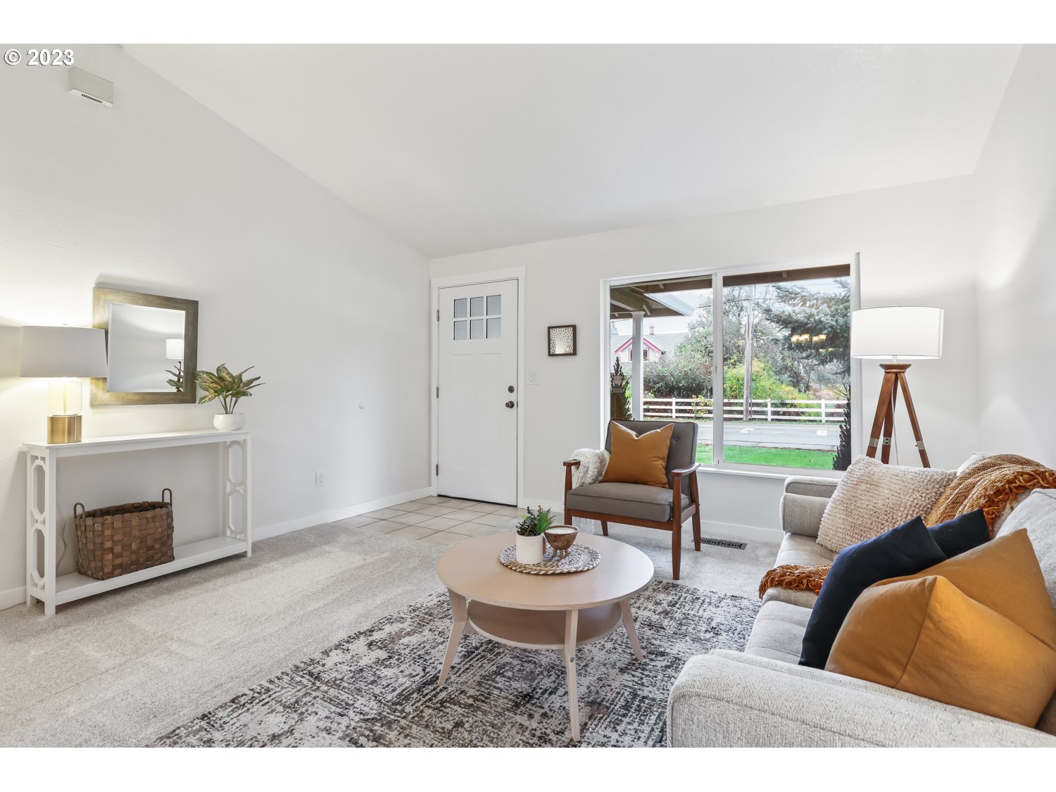 1203 Southeast Barnes Road Gresham, OR 97080 - Photo 5 of 43 a living room with furniture and a fireplace