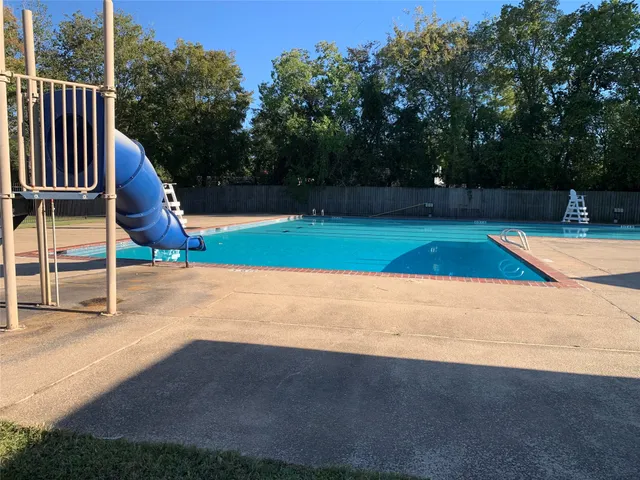 a view of outdoor space pool patio and yard