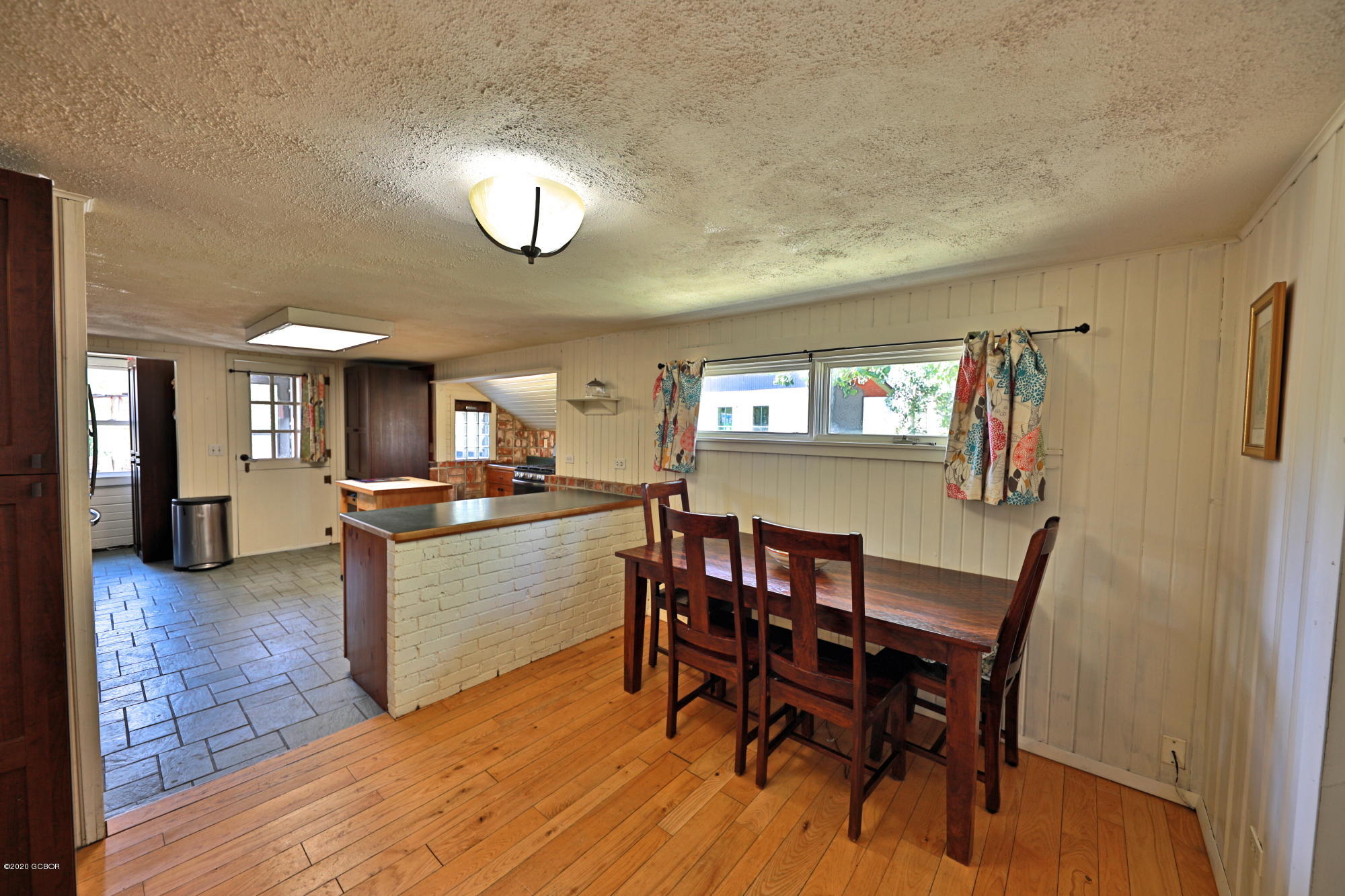 539 Kings Crossing Road Winter Park, CO 80482 - Photo 12 of 35 a view of a dining room with furniture and a chandelier