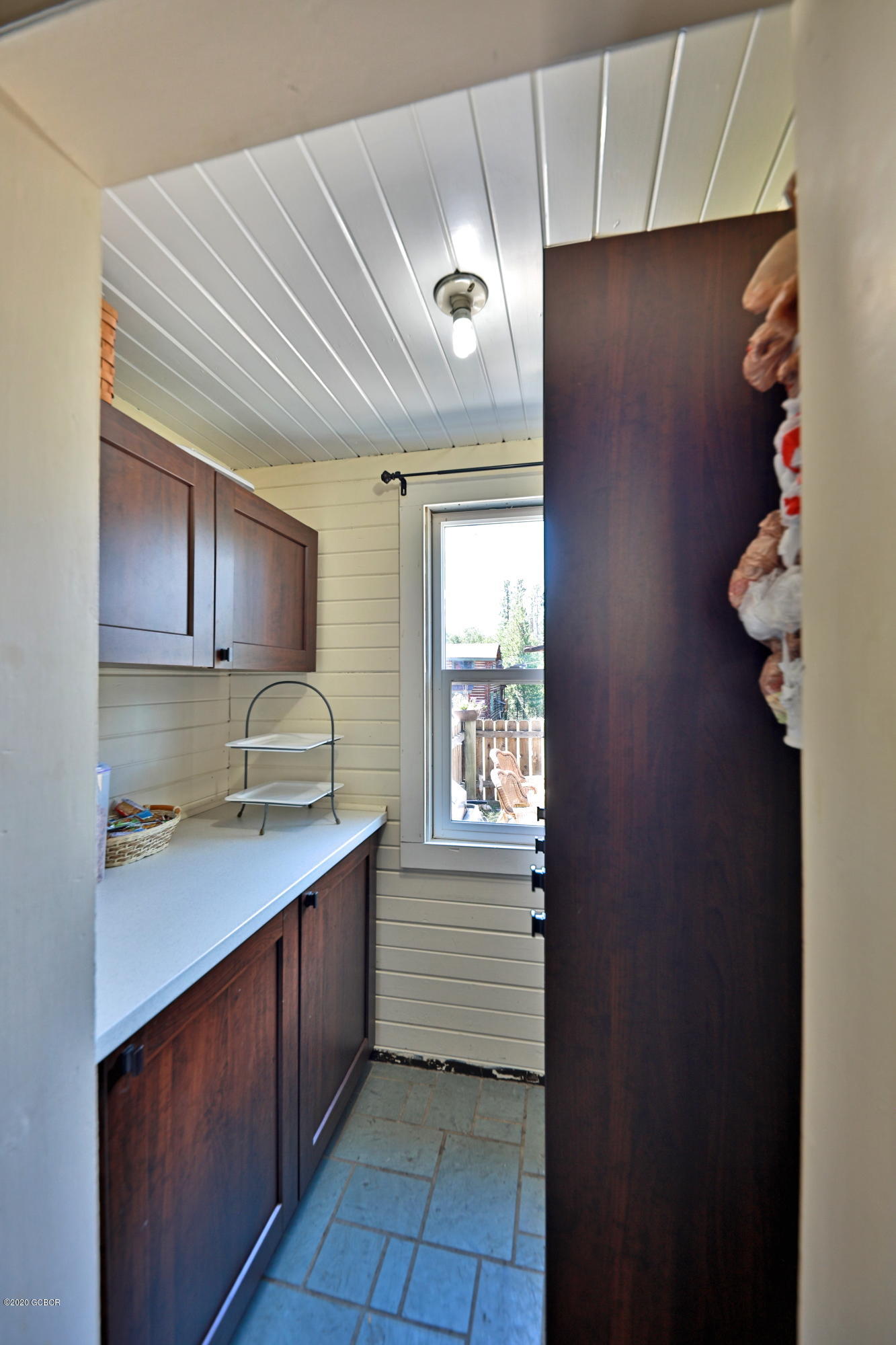 539 Kings Crossing Road Winter Park, CO 80482 - Photo 13 of 35 a kitchen with a sink a cabinets and window