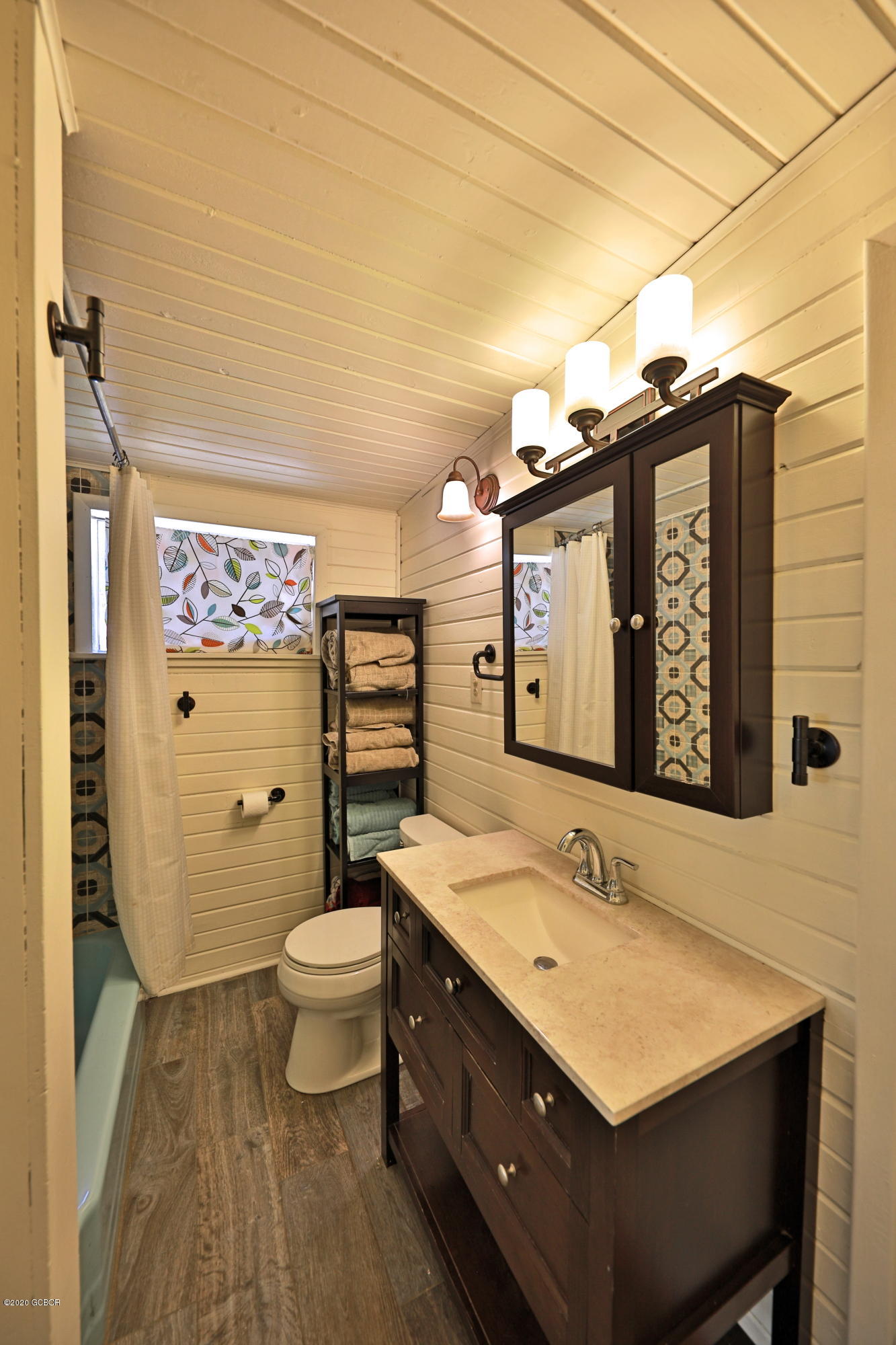 539 Kings Crossing Road Winter Park, CO 80482 - Photo 14 of 35 a bathroom with a sink a toilet and shower