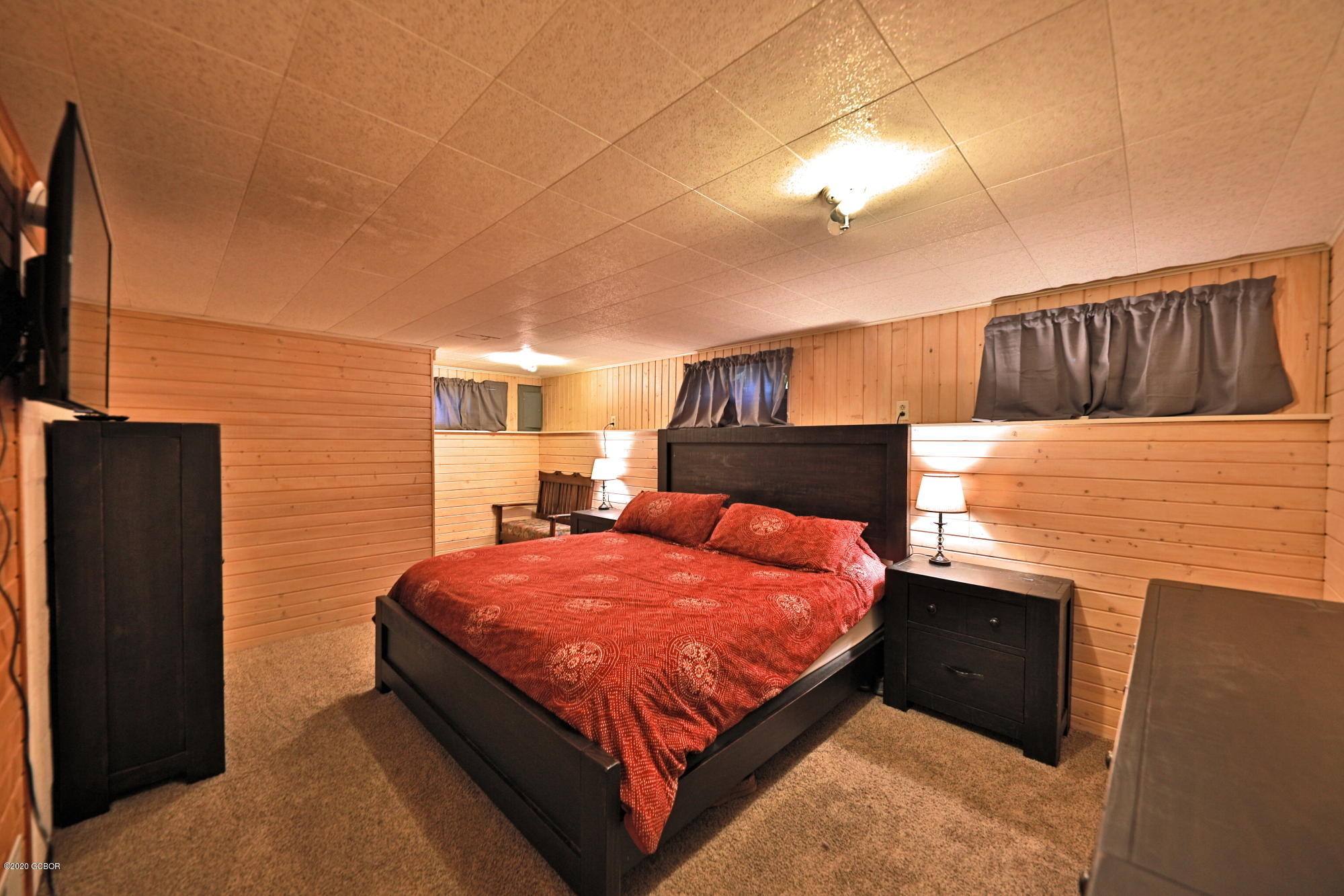 539 Kings Crossing Road Winter Park, CO 80482 - Photo 19 of 35 a bedroom with a bed and a television