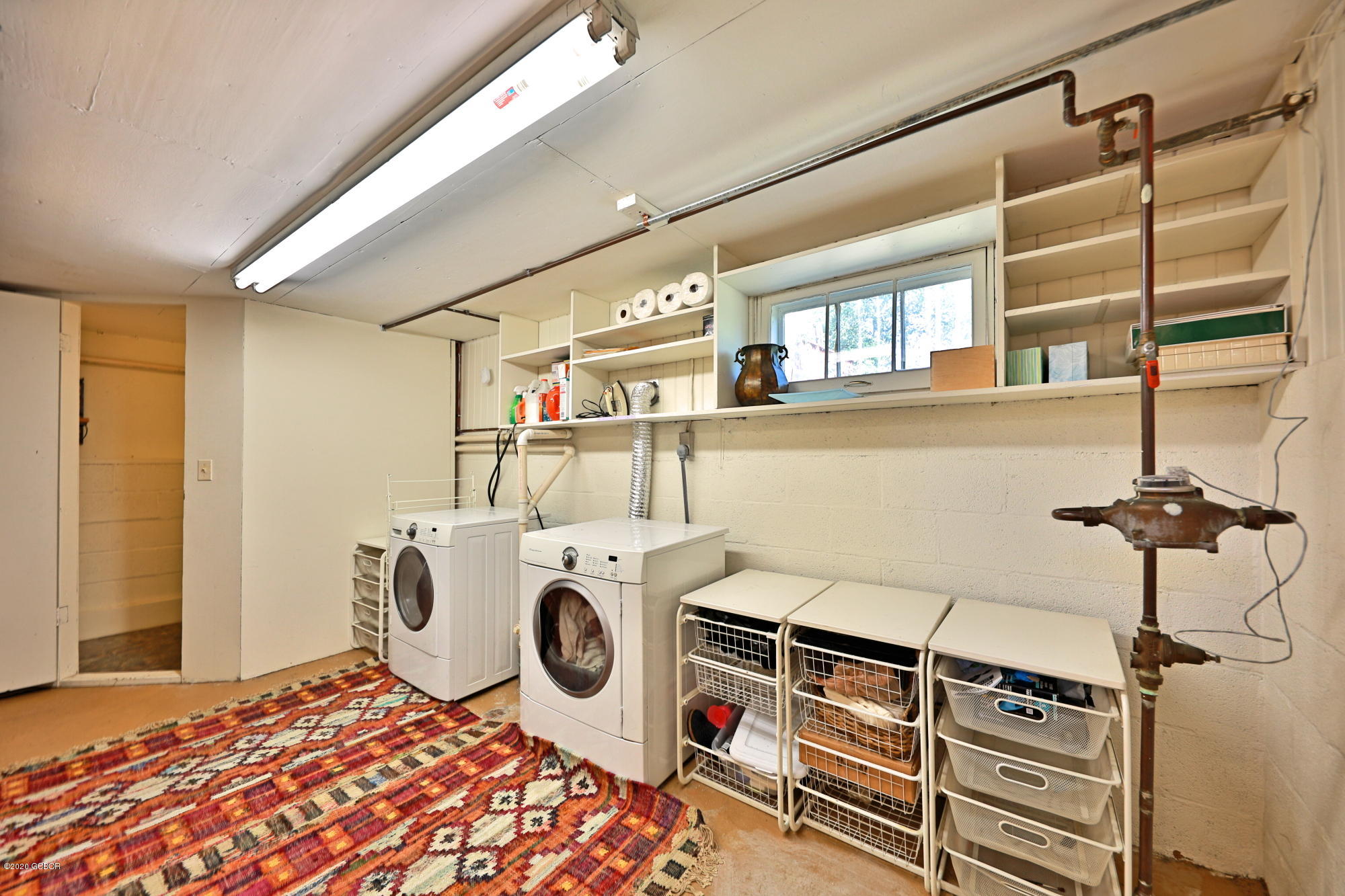539 Kings Crossing Road Winter Park, CO 80482 - Photo 22 of 35 a utility room with dryer and washer