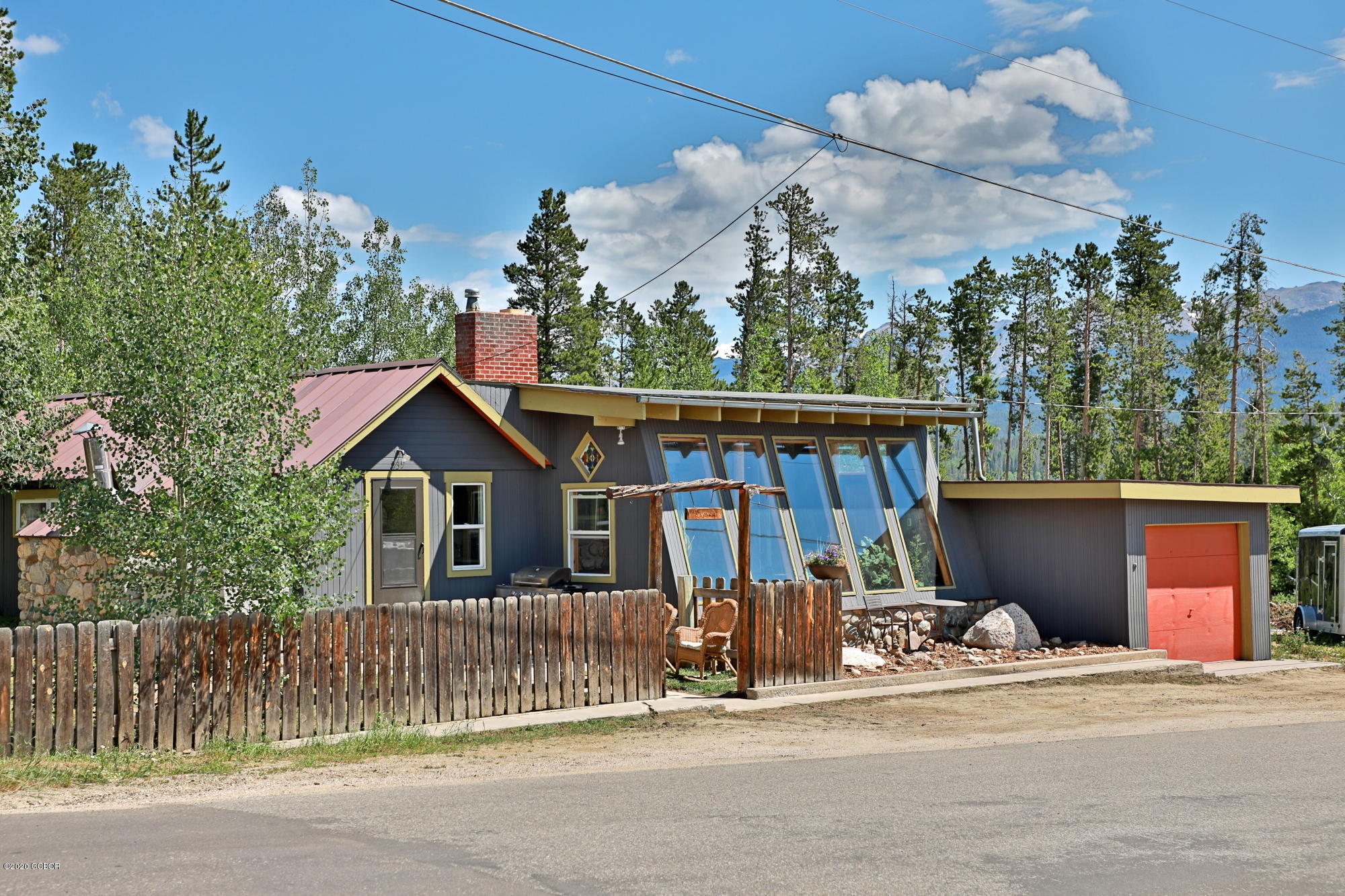 539 Kings Crossing Road Winter Park, CO 80482 - Photo 25 of 35 front view of a house with a garden