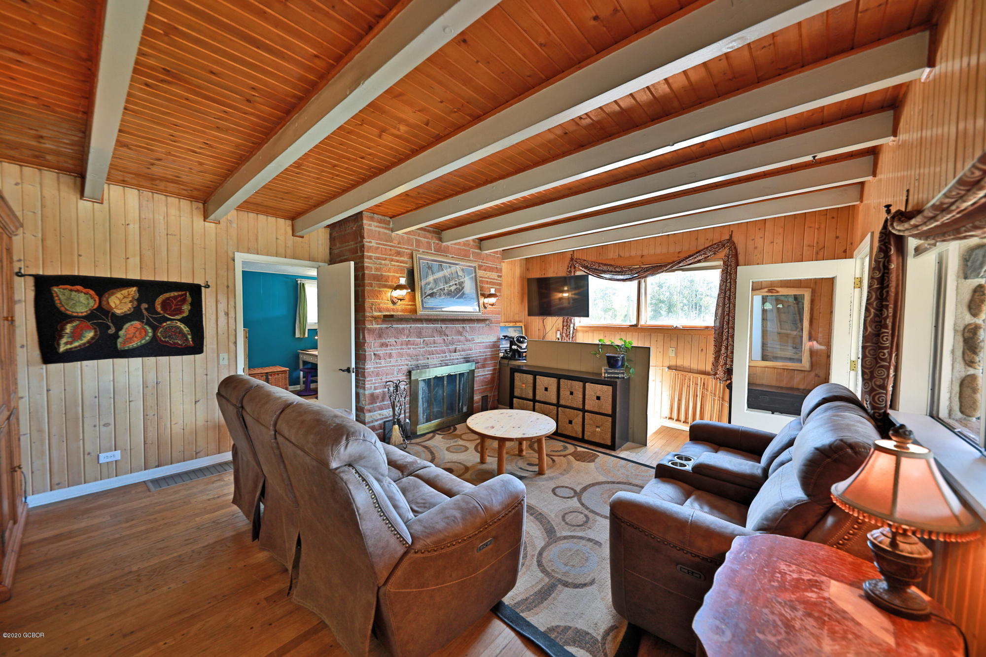 539 Kings Crossing Road Winter Park, CO 80482 - Photo 5 of 35 a living room with furniture and a large window