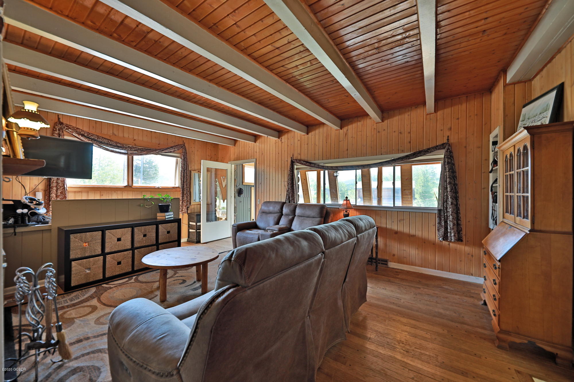 539 Kings Crossing Road Winter Park, CO 80482 - Photo 6 of 35 a living room with furniture a ceiling fan and a window