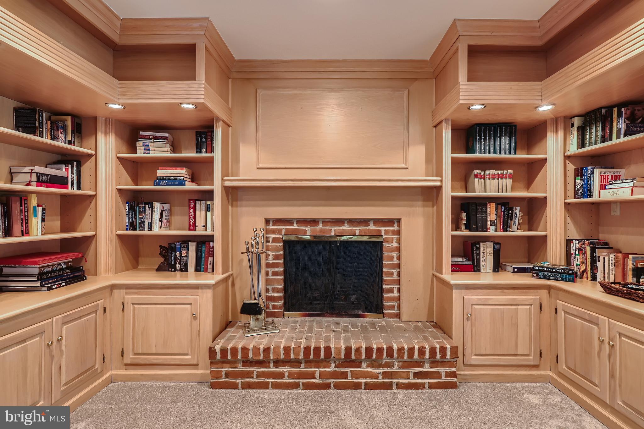 1308 Denby Road Towson, MD 21286 - Photo 13 of 35 Wood burning FP with built in bookshelves