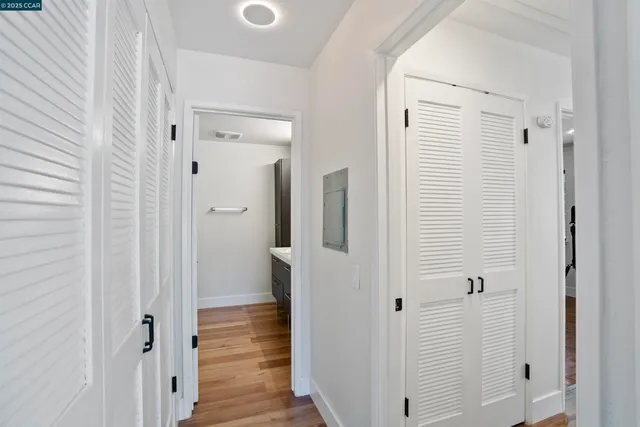 a view of a bathroom with closet area