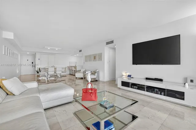 a spacious bathroom with a granite countertop sink a mirror and a shower