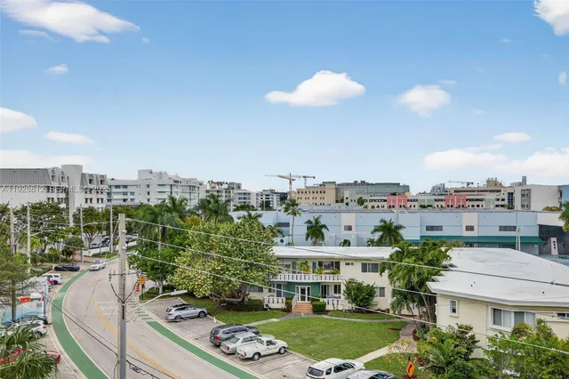 a bathroom with a shower a toilet and a shower