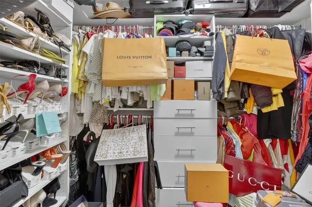 an aerial view of a house with a lake view