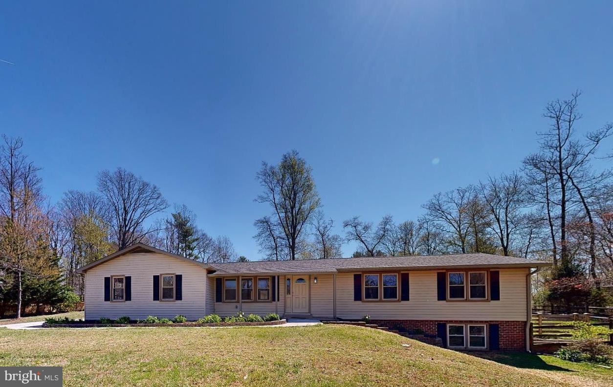 729 West Watersville Road Mount Airy, MD 21771 - Photo 1 of 42 a front view of a house with a yard