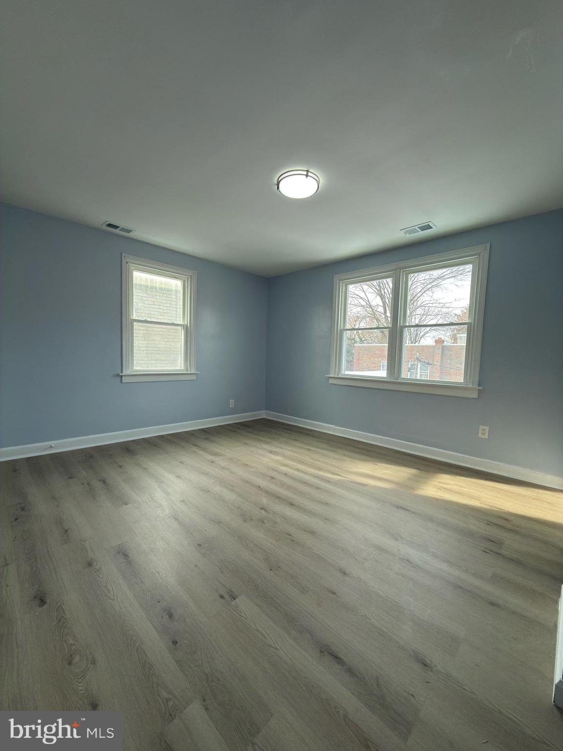 5734 Rising Sun Avenue Philadelphia, PA 19120 - Photo 5 of 8 an empty room with a window