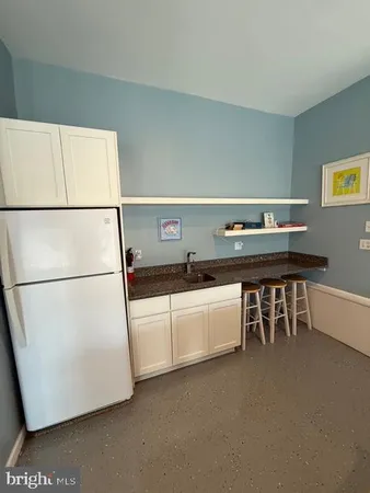 a living room with a couch and a flat screen tv