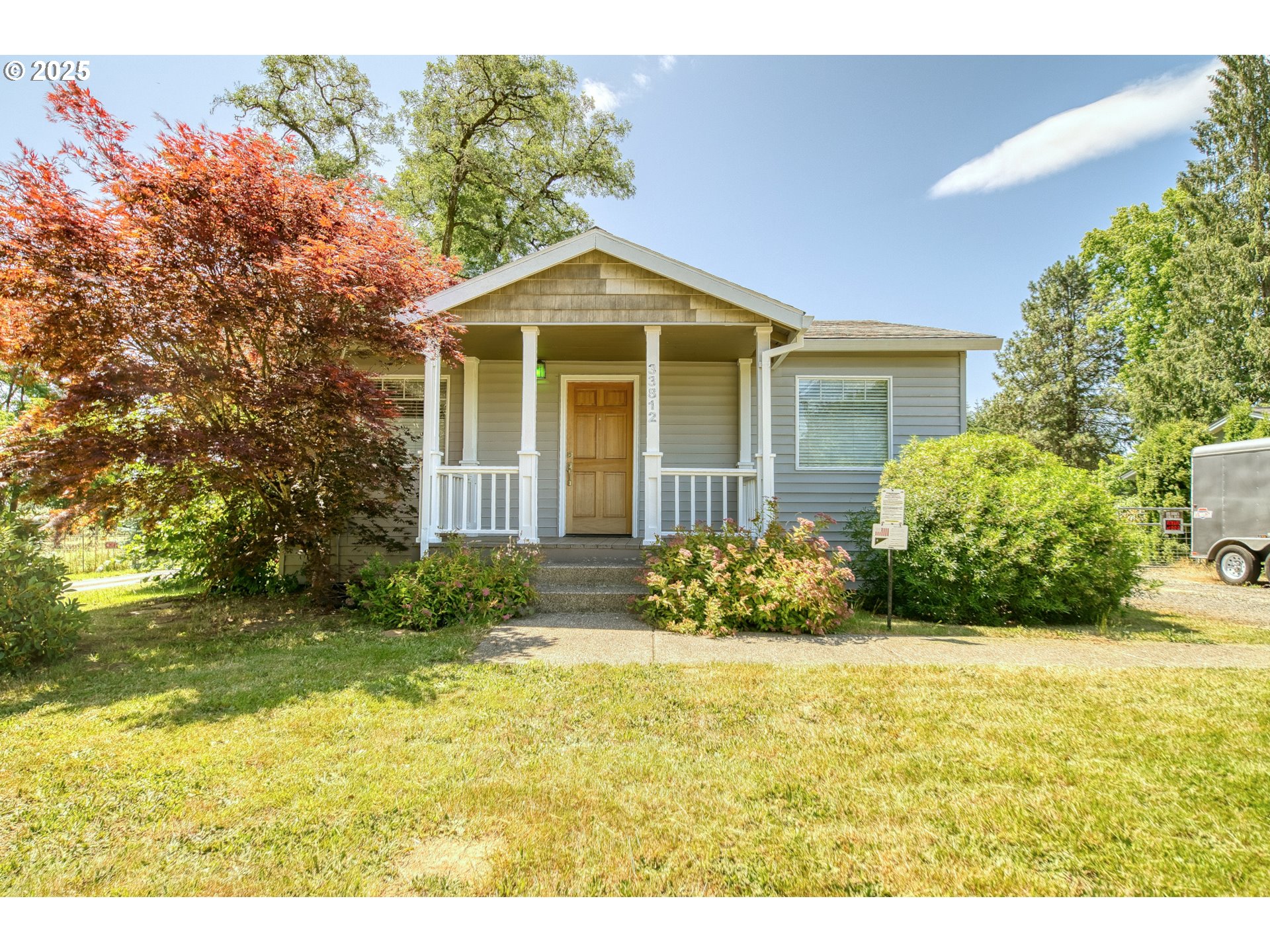 33812 Berg Road Warren, OR 97053 - Photo 2 of 20 a front view of a house with garden