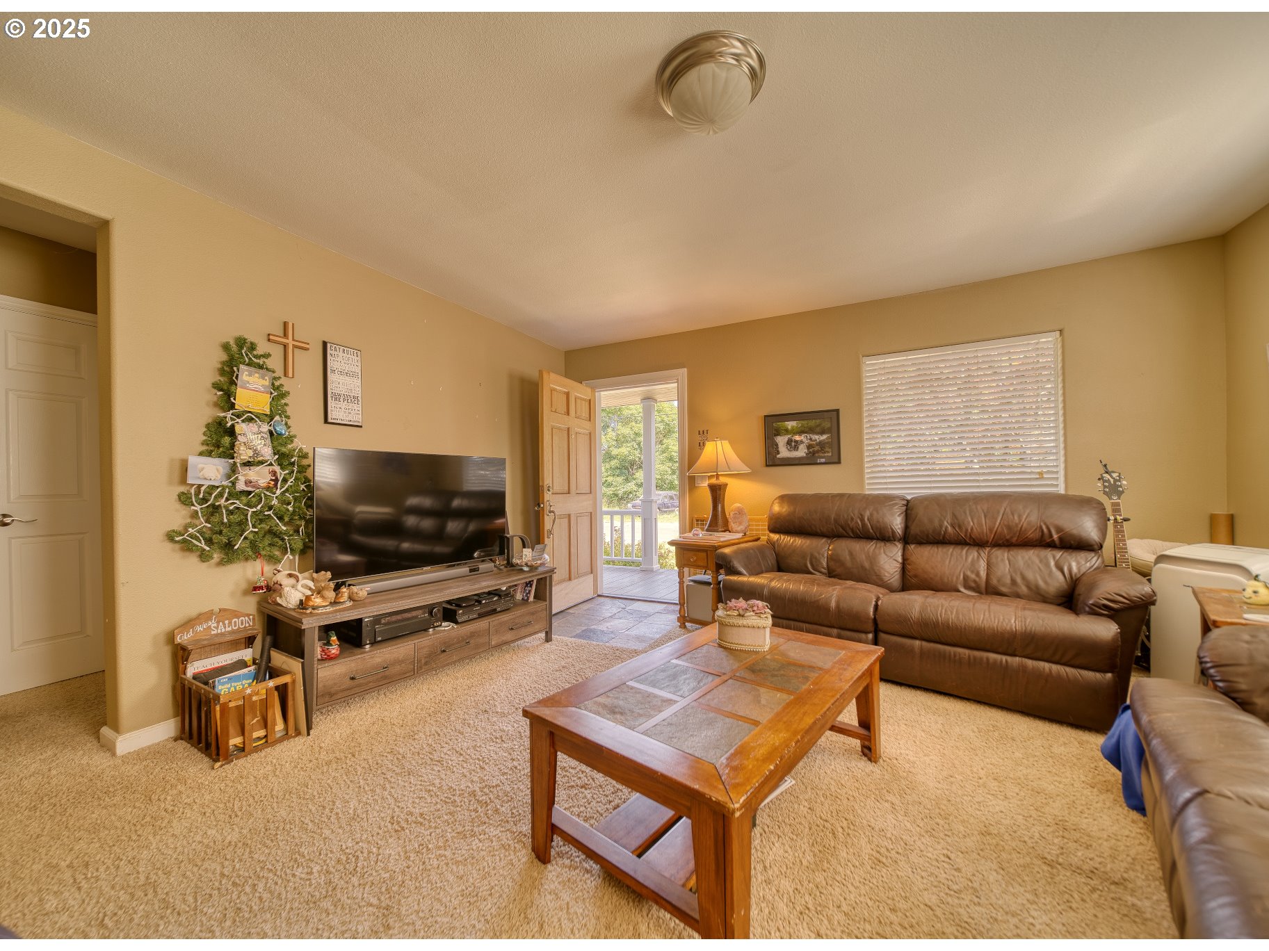 33812 Berg Road Warren, OR 97053 - Photo 3 of 20 a living room with furniture and a flat screen tv