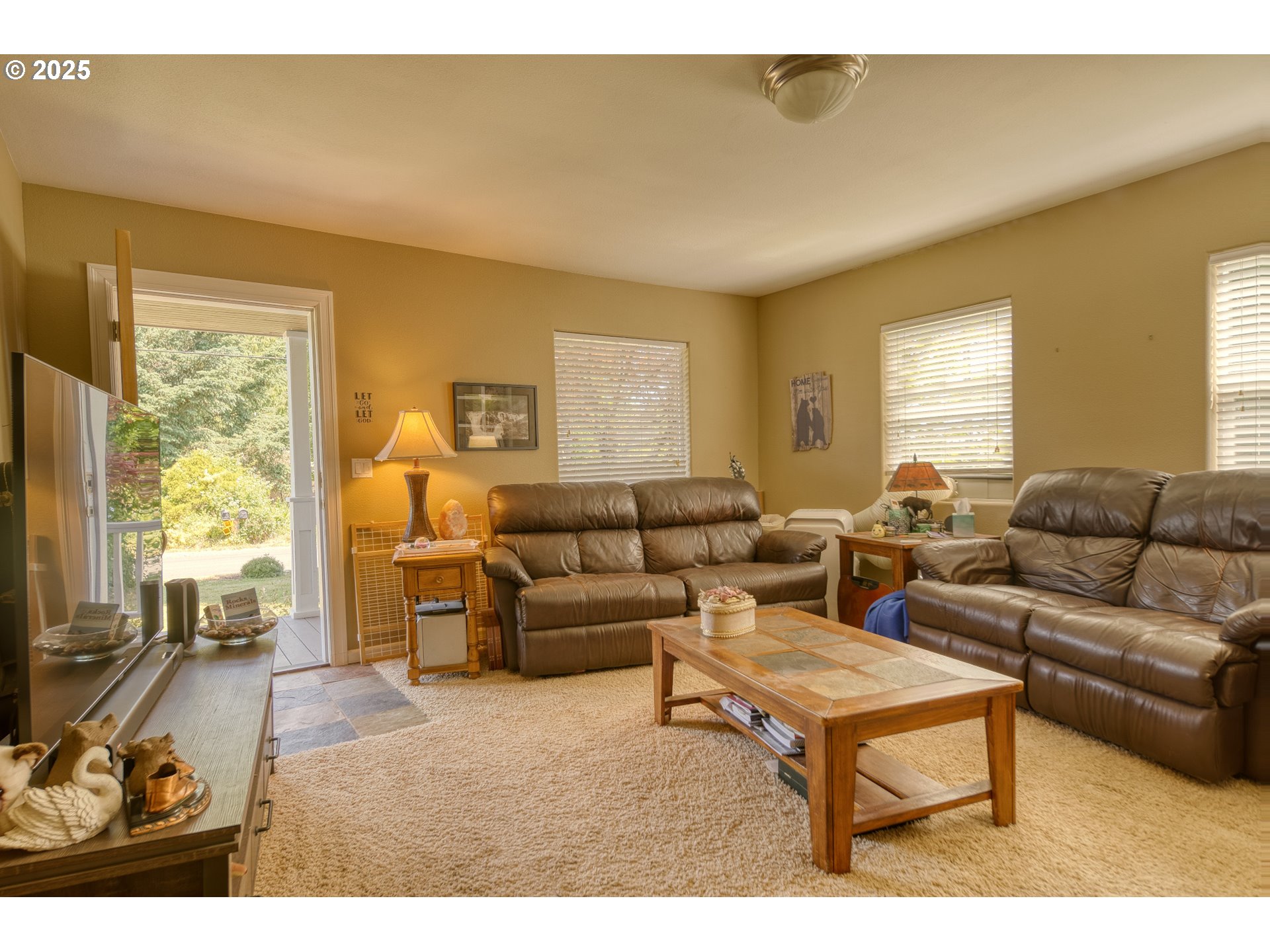 33812 Berg Road Warren, OR 97053 - Photo 4 of 20 a living room with furniture and a large window