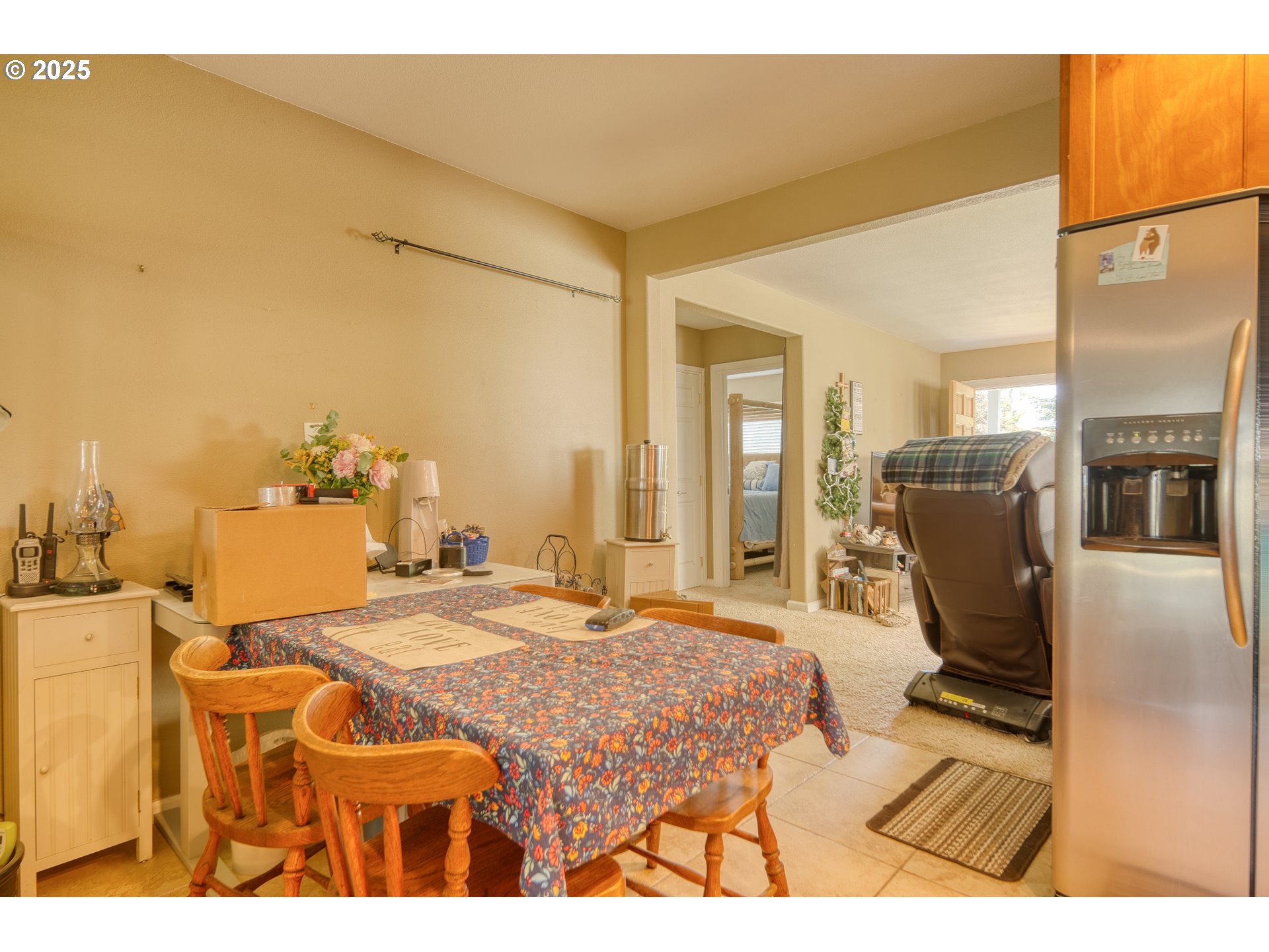 33812 Berg Road Warren, OR 97053 - Photo 7 of 20 a bedroom with a bed a table and chair