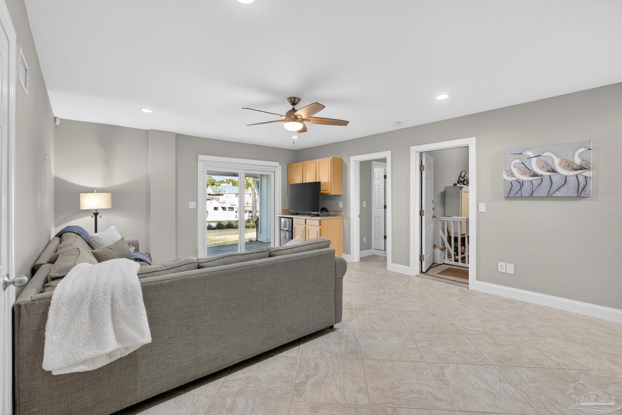 26355 Marina Road Orange Beach, AL 36561 - Photo 29 of 58 a living room with furniture and a window