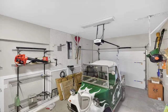 a view of a swimming pool with a table and chairs