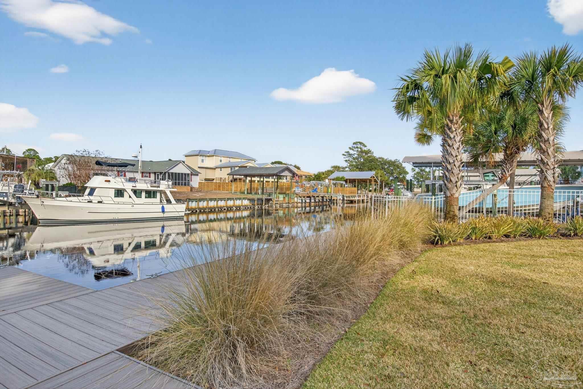 26355 Marina Road Orange Beach, AL 36561 - Photo 44 of 58 a view of a lake with houses
