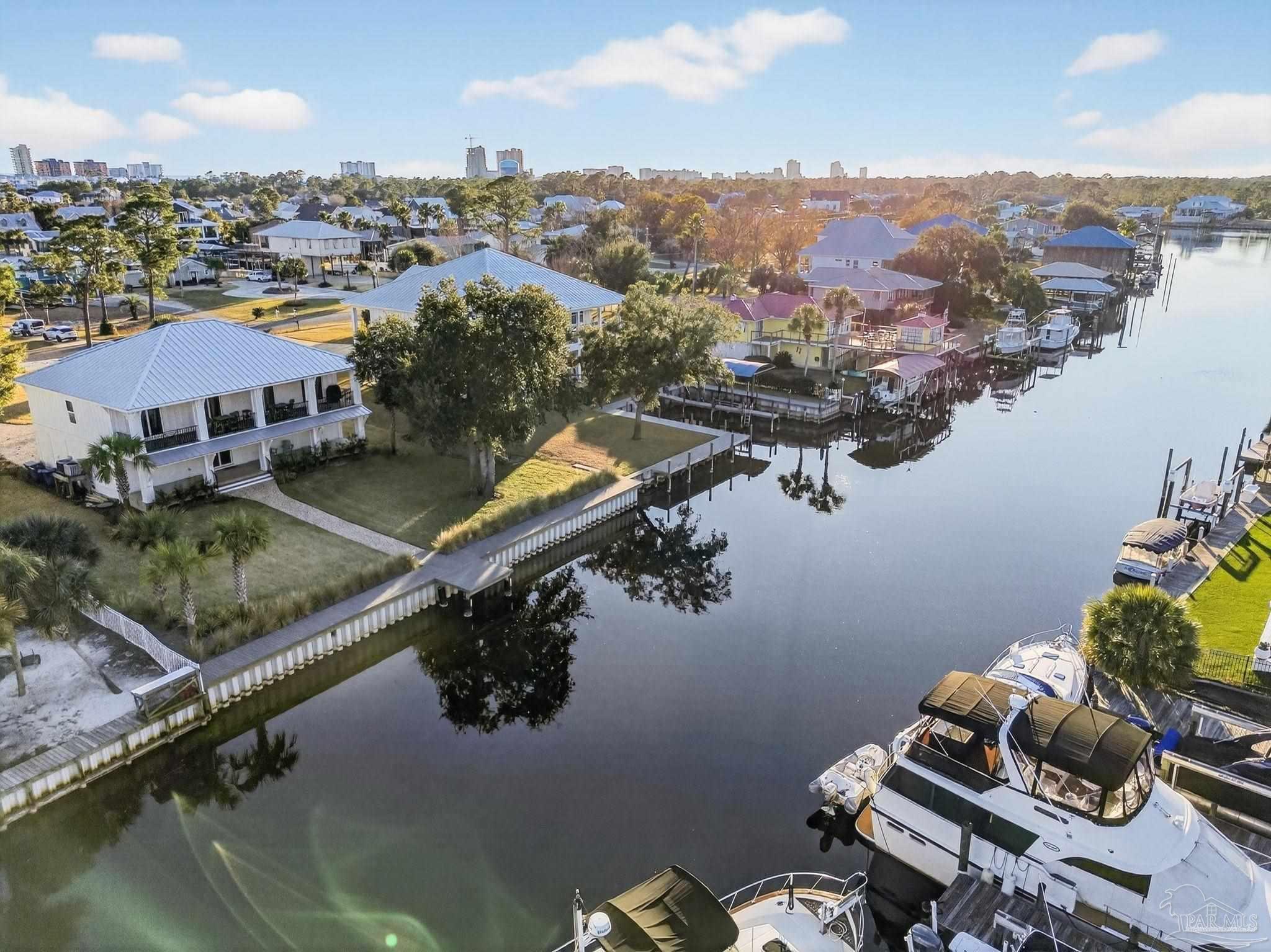 26355 Marina Road Orange Beach, AL 36561 - Photo 50 of 58 an aerial view of a house with a lake view