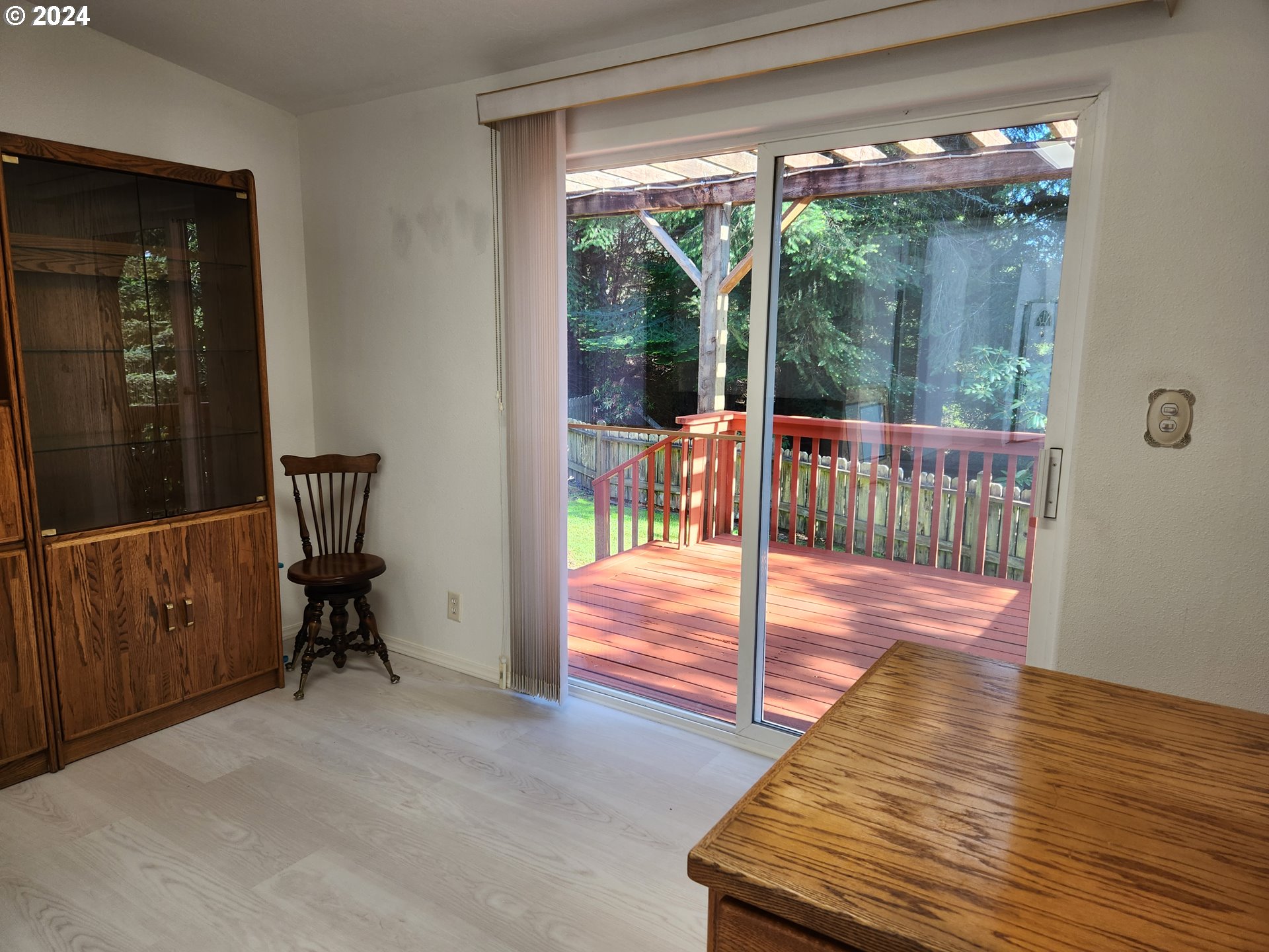 1675 Kristi Loop Lakeside, OR 97449 - Photo 21 of 30 a view of a hallway with furniture and front door