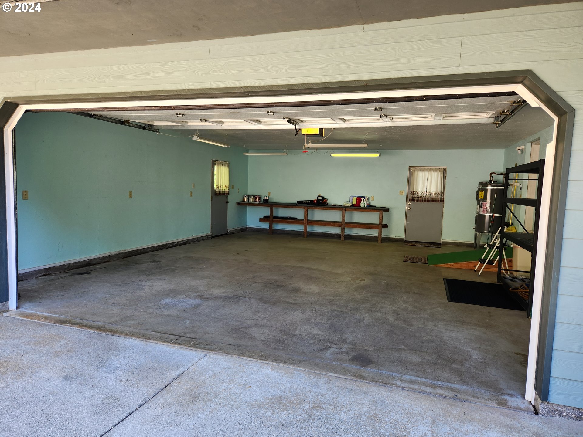 1675 Kristi Loop Lakeside, OR 97449 - Photo 28 of 30 a view of a garage