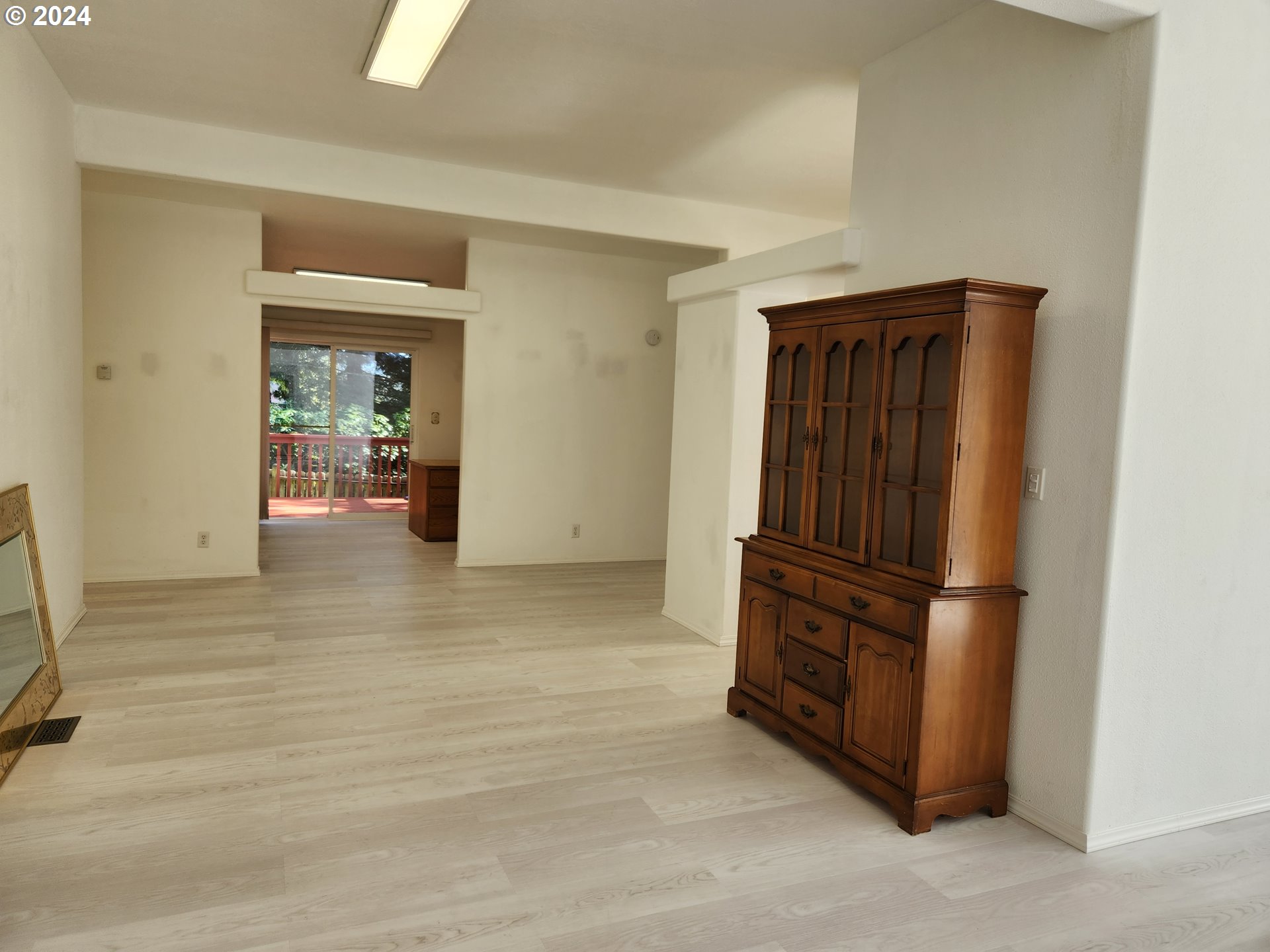 1675 Kristi Loop Lakeside, OR 97449 - Photo 8 of 30 a view of kitchen with furniture and refrigerator