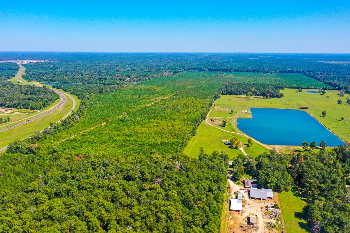 0 Fm 1010 Cleveland, TX 77327 - Photo 26 of 35 an aerial view of a houses with a yard