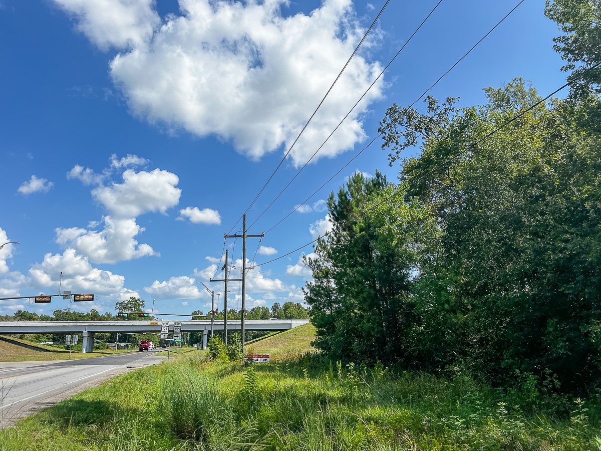 0 Fm 1010 Cleveland, TX 77327 - Photo 35 of 35 a view of a fountain in front of house with a yard