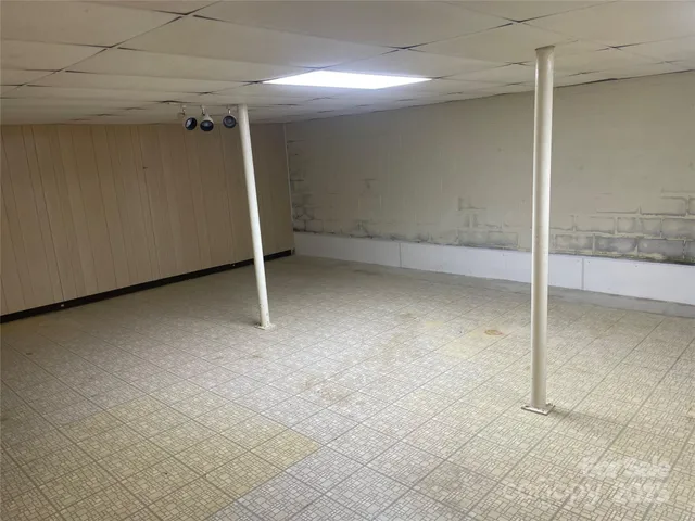 a view of a storage & utility room with closet